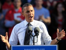 El 56 % de los latinos en el estado afirma estar seguro de que votará por Obama, frente al 27 % que apuesta por Romney. AP  /