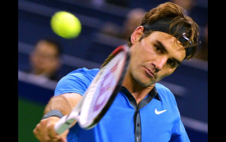 Roger Federer se impuso a su compatriota Stanislas Wawrinka en tres sets. AFP  /