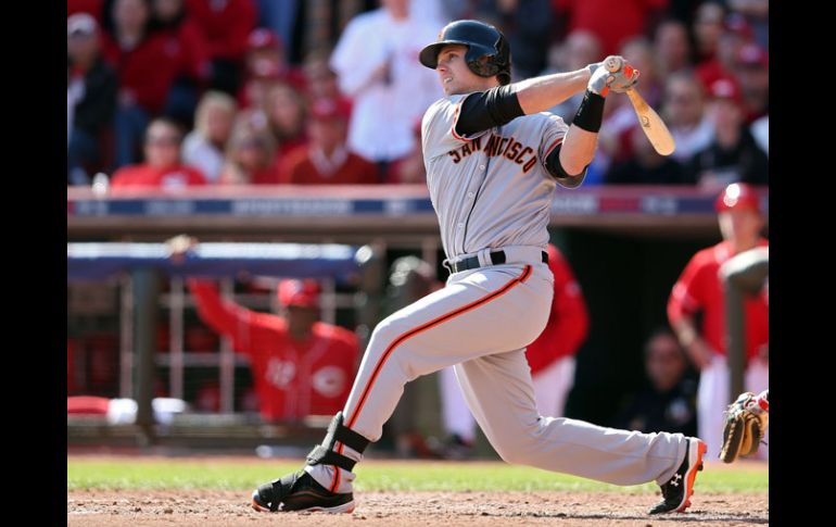 Buster Posey produjo cuatro carreras con un batazo de cuatro esquinas. AFP  /