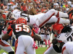 Acción del partido entre Cleveland y Cincinnati que termina con victoria para los Cafés. AP  /