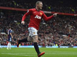 Rooney metió tres goles, dos contra el Stoke y uno en su propia portería. REUTERS  /