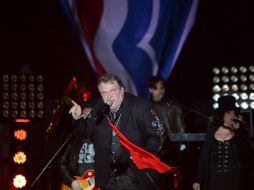 Meat Loaf aparece en el escenario del estadio local de Defiance y, entre gritos y música, llama a votar por Mitt Romney. AFP  /