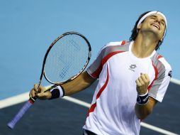 El tenista español David Ferrer festeja su triunfo ante Ivan Dodig y su pase a la final. EFE  /