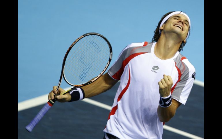 El tenista español David Ferrer festeja su triunfo ante Ivan Dodig y su pase a la final. EFE  /