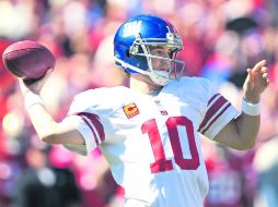 Eli Manning buscará saldar la derrota que sufrieron en el inicio de la campaña, precisamente ante los Vaqueros de Dallas. AP  /