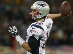 Tom Brady supo llevar a otro triunfo a los Patriotas en Wembley. AP  /