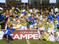 El equipo de Sinaloa festeja su triunfo en la final de la Copa MX ante Correcaminos.MEXSPORT  /