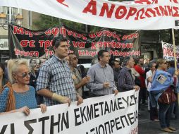 Periodistas griegos protesta en contra de las nuevas medidas de austeridad. EFE  /