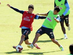 Ángel Reyna (izq) durante la práctica del Monterrey. MEXSPORT  /