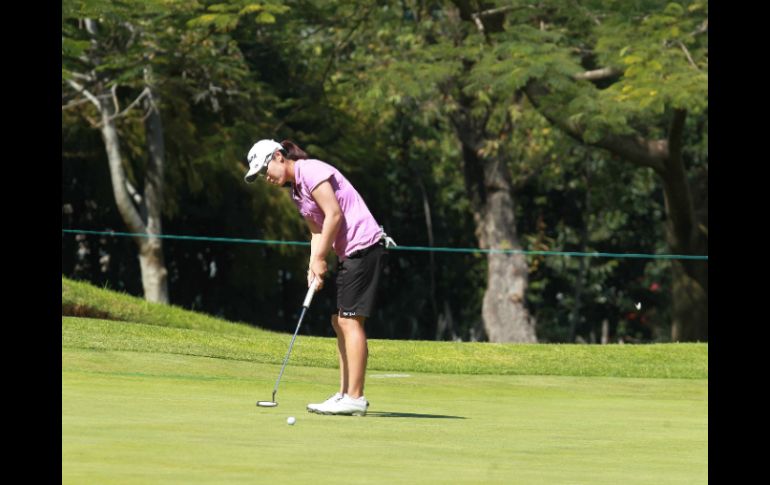 Candie Kung (foto), junto a Michelle Wie y Angela Stanford ya iniciaron su recorrido por el campo.  /