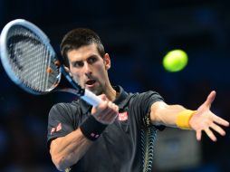 El número uno del mundo cerró la fase de grupos con un porcentaje perfecto. AFP  /