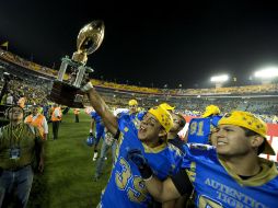 Los Auténticos Tigres levantaron el trofeo en la ONEFA. MEXSPORT  /