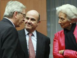 El presidente del Eurogrupo, el ministro español de Economía y la Directora Gerente del FMI. EFE  /