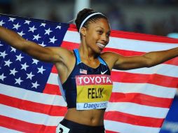 Allyson Felix, primera mujer, desde Florence Griffith-Joyner, en conseguir tres oros en una misma cita olímpica. ARCHIVO  /