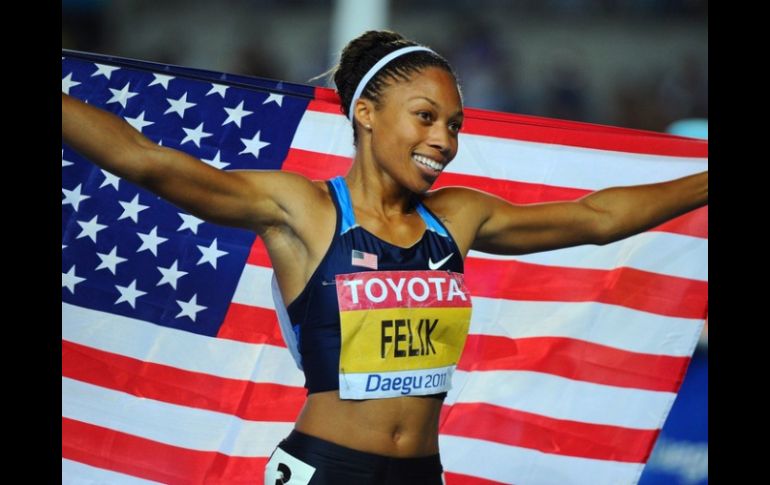 Allyson Felix, primera mujer, desde Florence Griffith-Joyner, en conseguir tres oros en una misma cita olímpica. ARCHIVO  /