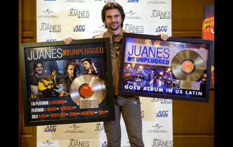 Juanes fue galardonado con un disco de oro por las ventas en Estados Unidos y Puerto Rico. AFP  /