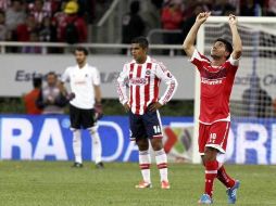 Antonio Naelson 'Sinha' celebra el segundo gol de los Diablos en el partido. MEXSPORT  /