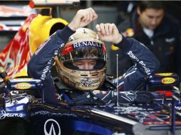 Sebastian Vettel de Alemania se sienta en su coche durante la tercera sesión de entrenamientos de los EU. REUTERS  /