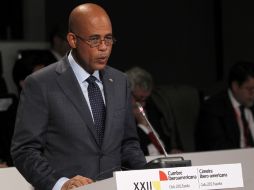 Martelly ha participado en la Cumbre Iberoamericana celebrada en Cádiz donde ha hablado con haitianos residentes en España. AFP  /