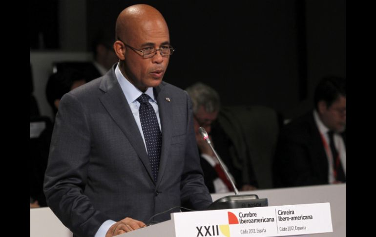 Martelly ha participado en la Cumbre Iberoamericana celebrada en Cádiz donde ha hablado con haitianos residentes en España. AFP  /