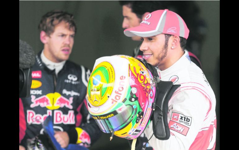 Listos. Lewis Hamilton saldrá primero; Sebastian Vettel irá por el desafío. AP  /