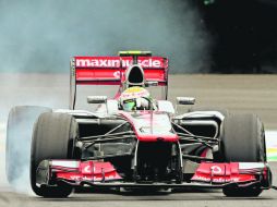 Preciso. Lewis Hamilton toma una curva, durante la sesión de calificación en la pista de Sao Paulo.  /