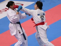 La japonesa Ayumi Uekusa pelea contra la suiza Jessica Cargill. AFP  /