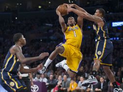 Los diezmados Pacers no brillaron con su juego ofensivo, pero supieron anotar los puntos decisivos. XINHUA  /