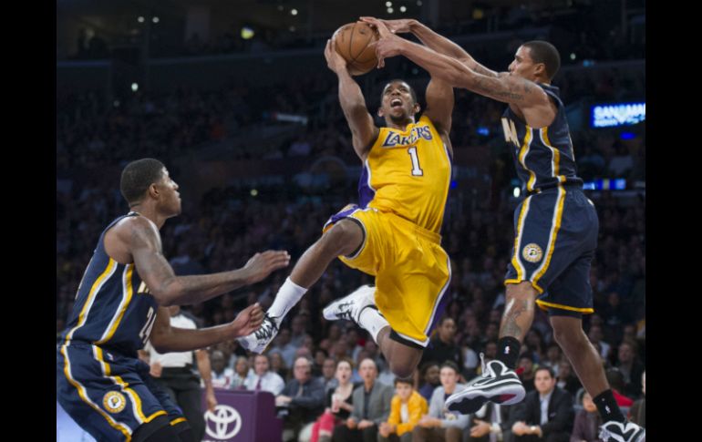 Los diezmados Pacers no brillaron con su juego ofensivo, pero supieron anotar los puntos decisivos. XINHUA  /