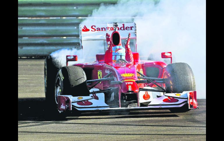 Por mientras. Fernando Alonso realiza actividades promocionales con Ferrari, y luego seguirá de vacaciones. EFE  /