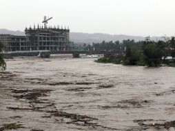 Al menos 54 personas han muerto y más de 55 mil han sido evacuadas hoy a causa del tifón ''Bopha''. EFE  /