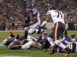 Adrian Peterson fue la estrella del partido una vez más para los Vikingos. REUTERS  /