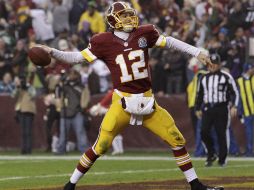 Kirk Cousins logró empatar el partido para enviarlo a tiempo extra. AP  /