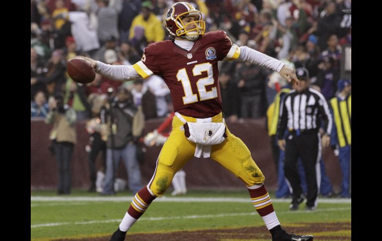 Kirk Cousins logró empatar el partido para enviarlo a tiempo extra. AP  /