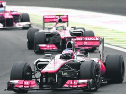 La última del año. Jenson Button se llevó a la bandera a cuadros en el Gran Premio de Brasil. AP  /