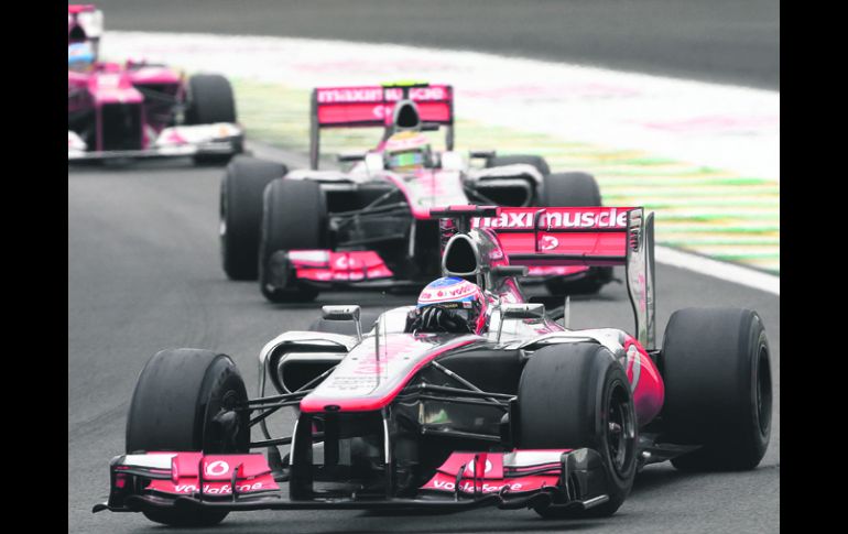 La última del año. Jenson Button se llevó a la bandera a cuadros en el Gran Premio de Brasil. AP  /