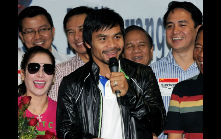 Manny Pacquiao (c), en una ceremonia de bienvenida en su honor en Manila (Filipinas). AFP  /