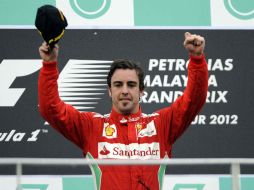 El piloto Fernando Alonso se dijo capaz de ganar más títulos en la F1. MEXSPORT  /