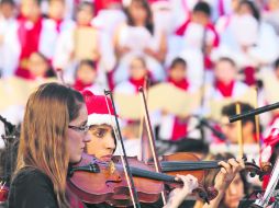 Los acordes y las voces de la Orquesta Filarmónica Infantil y Juvenil de la SEJ hicieron una velada diferente en el Centro tapatío.  /