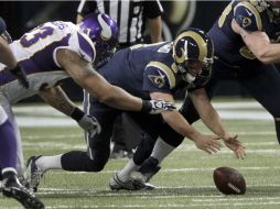 Los Vikingos anotaron 10 puntos a partir de balones perdidos por Sam Bradford. AP  /