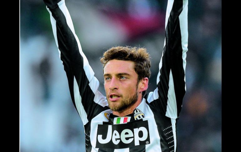 Puños apretados. Claudio Marchisio sentenció el duelo frente al Atalanta y se perfilan para ganar un Scudetto más. AFP  /