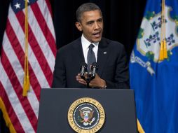 El presidente de Estados Unidos Barack Obama durante la vigilia en honor a las victimas de la matanza en Newton, Connecticut. AP  /