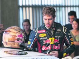 En vacaciones. Sebastian Vettel tomó parte de la ''Race of Champions'' en Tailandia.  AP  /