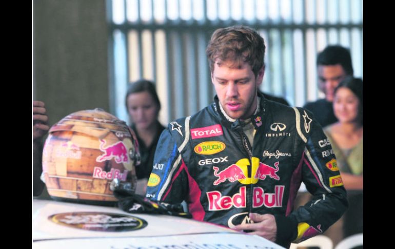 En vacaciones. Sebastian Vettel tomó parte de la ''Race of Champions'' en Tailandia.  AP  /