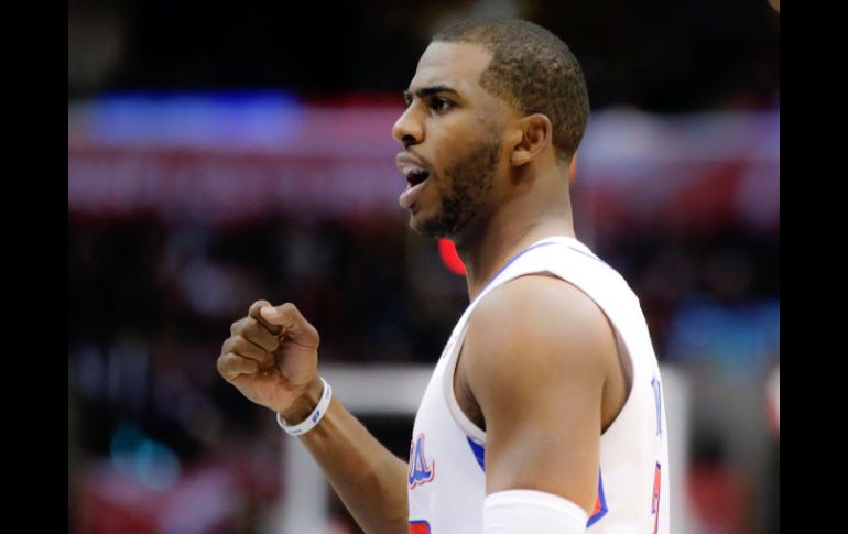 Chris Paul aportó 10 puntos y 12 asistencias con las que superó la marca de las cinco mil. AP  /