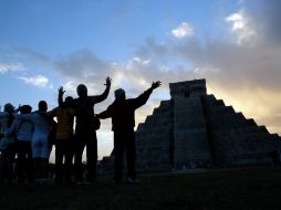 Se espera que este fin de semana continúe la llegada de visitantes a los sitios prehispánicos como Chichén Itzá. AP  /