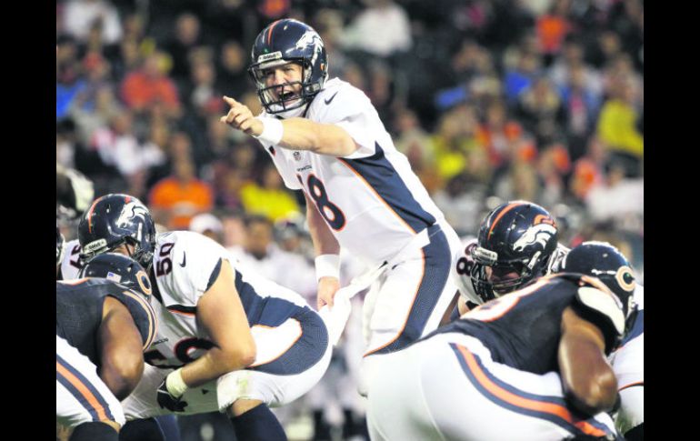 Peyton Manning ya aseguró un lugar en postemporada con sus Broncos de Denver, luego de no jugar el año anterior debido a una lesión. AP  /