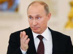 No veo motivos para no firmar (le ley), aunque debo mirar la versión definitiva,declaró Putin en una reunión en el Kremlin. AFP  /