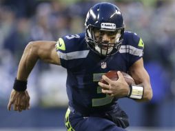 Russell Wilson empató el récord de más pases de touchdown para un novato, con 26. AP  /