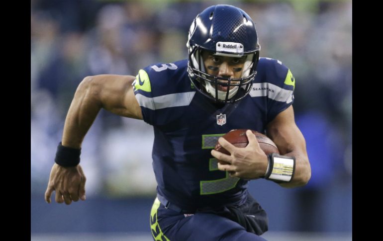 Russell Wilson empató el récord de más pases de touchdown para un novato, con 26. AP  /